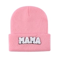 Detailed view of pink knitted beanie featuring white MAMA chenille letter embroidery - Pink