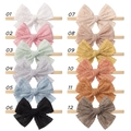 Set of 12 solid color hollow bow baby headbands made of nylon and cotton fabric - Mixed Colors