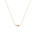 Detailed close-up of 18k gold-plated necklace featuring a cluster of white pearls - June/Moonlight White