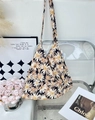 Floral canvas shoulder bag featuring white daisies and MISS label on a black background - Black Background Daisy(52#)