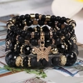 Mehrlagiges schwarzes Perlenarmband-Set im Boho-Stil mit goldenem Schmetterling - Schwarz