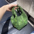 Detailed view of vibrant lime green rhinestone encrusted mini bucket bag with silver handle - Green