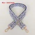Close-up of blue and white geometric woven strap with adjustable gold-tone metal hardware - Blue + Gold Hook