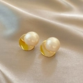 Elegant gold round stud earrings featuring large creamy white pearls on silk background - Classic Simple Round Gold Base Pearl Stud Earrings
