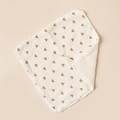 Detail of soft cotton baby bib with brown heart print and white pompom trim - Heart And Beige