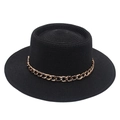 Detail view of black straw sun hat featuring elegant flat top and golden chain trim - One Size / Black (with Acrylic Chain Decor)