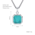 Collana in acciaio al titanio con pendente ottagonale dorato e inserto in pietra nera - Acciaio - Turchese