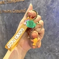Cute brown capybara keychain with yellow fish charm and Luck Day silicone hand strap - B354-3 Fish