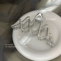 Silver geometric metal shark hair claw clip 11.5cm for thick hair on ceramic plate - Large Silver Wave
