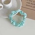 Elegant mint green satin scrunchie with silky finish for a traceless hair ponytail - Cyan