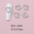 Detailed silver heart nail charm with bow and rhinestones, size 10.5x10mm closeup - Silver Hollow Heart Side Bowknot Style (A089)