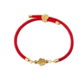 Close-up of red Milanese cord bracelet featuring 18K gold flower charm and adjustable clasp - Red (Five-petal Flower)
