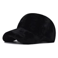 Close-up of the plush faux fur texture on a warm black winter baseball cap - Adjustable / Black