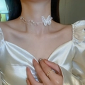 Close-up of white mesh flower choker with delicate pearl strands on elegant model - 13# White Butterfly