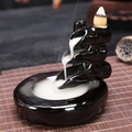 Creative black ceramic backflow incense burner with a natural glazed finish on bamboo mat - Moving Clouds and Flowing Water