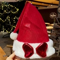 Red metallic Christmas hat with plush trim and large bow for festive holiday parties - Red Bow Christmas Hat