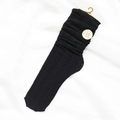 Black cable knit slouch socks for women featuring hollow mesh texture and elastic cuffs - Cable Knit Slouch Socks / Black