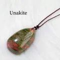 Natural teardrop-shaped unakite crystal pendant with a brown braided rope necklace cord - Unakite Teardrop Pendant