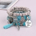 Bohemian multilayer beaded bracelet set with turquoise tassels and feather charms - Lake Blue