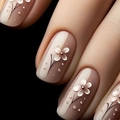 Short square press-on nails with nude pink floral design and pearl 3D accents - Yellow Jelly Glue + Nail File Style