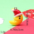 Detailed view of yellow moon resin charm with Santa hat including size and weight specs - 15# Yellow Crescent Moon