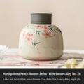 Mini ceramic tea canister with hand-painted peach blossom and matte black alloy lid - Hand Painted Peach Blossom - Bottom Wide Alloy Jar
