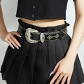 Western style black leather belt featuring a detailed silver rhinestone buckle with embossing - Black
