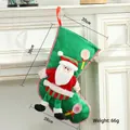 Green Christmas stocking featuring 3D Santa and lollipop design for festive holiday gifts - Large Candy Santa Style