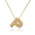 Detailed view of gold letter P pendant with micro-pave cubic zirconia on box chain - Letter P