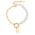 Detail of gold paperclip chain and white pearls bracelet with a letter R pendant - Gold - Letter R