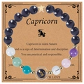 Macro detail of Capricorn zodiac bracelet with blue sandstone and colorful beads - Capricorn