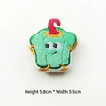 Detail of a green bell pepper plush pin with embroidery, size 5.8cm height and 5.5cm width - Green Pepper