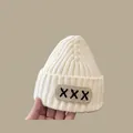 Winter knit baby bonnet with pointed top and decorative patch in off-white color - 2 Months-2 Years / XXX Baby Hat Cream White