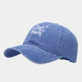 Detailed close-up of Cat Mom white embroidery on washed navy blue cotton baseball cap - Adjustable / Lake Blue