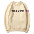 Unisex beige hoodie with black Freedom print and American flag sleeve patch detail - Khaki