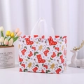 White Christmas non-woven gift bag with red gingerbread man and snowflake prints - Christmas Stocking White