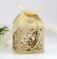 Macro view of champagne gold laser-cut heart pattern and premium pearl paper texture - Beige Gold