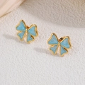 Light blue bow stud earrings in 18k gold plating with premium enamel finish on fabric - Blue Enamel Bow Knot