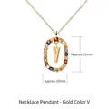 Gold-tone necklace pendant with an oval multi-color crystal ring and the letter V - 925 Silver / Letter V (Gold)
