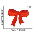 Detailed close-up of red embroidered bow patch with 6cm x 5cm dimensions and fine texture - Pink Bow Patch Style 11