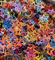 Colorful star-shaped metal hair clips with polka dots in a bulk assorted variety - Polka Dot Mixed Star