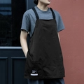 Black canvas work apron with adjustable straps and three pockets for kitchen and cafe - Short Workwear Apron / Black