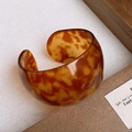 Detail showing high-gloss tortoiseshell resin wide cuff bracelet with C-shaped opening - 39# Bangle-Coffee-Acetate Plate