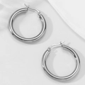 Polished silver stainless steel large hoop earrings with durable snap closure design - Silver