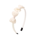 Detail of off-white fabric bow headband with heart-shaped layers and soft black end tips - Beige (No.21)