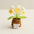 Handmade crochet lily of the valley plant with emotional support sign in a brown pot - Forget-Me-Not Gradient Yellow