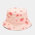Close-up of pink reversible bucket hat with peach and floral prints for sun protection - M (56-58cm) / Light Pink