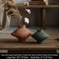Modern ceramic vase set in matte brown and dark green with geometric artistic design - Vase Set 3 (Peak Brown L + Dark Green S)