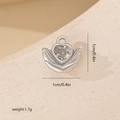 Detail view of a 1cm silver heart palm pendant with zircon inlay and weight info - White Gold Hand-held Heart (MYYX00672)
