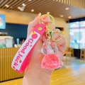 Pink unicorn quicksand keychain with Good Luck silicone strap and gold metal clasp - Unicorn Drifting Bottle-Pink